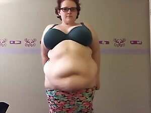Chubby cutie explores kinky sex in steamy video.